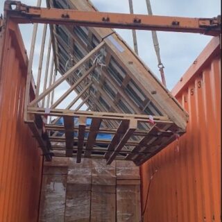 This is an image of a large pane of glass in a shipping container.